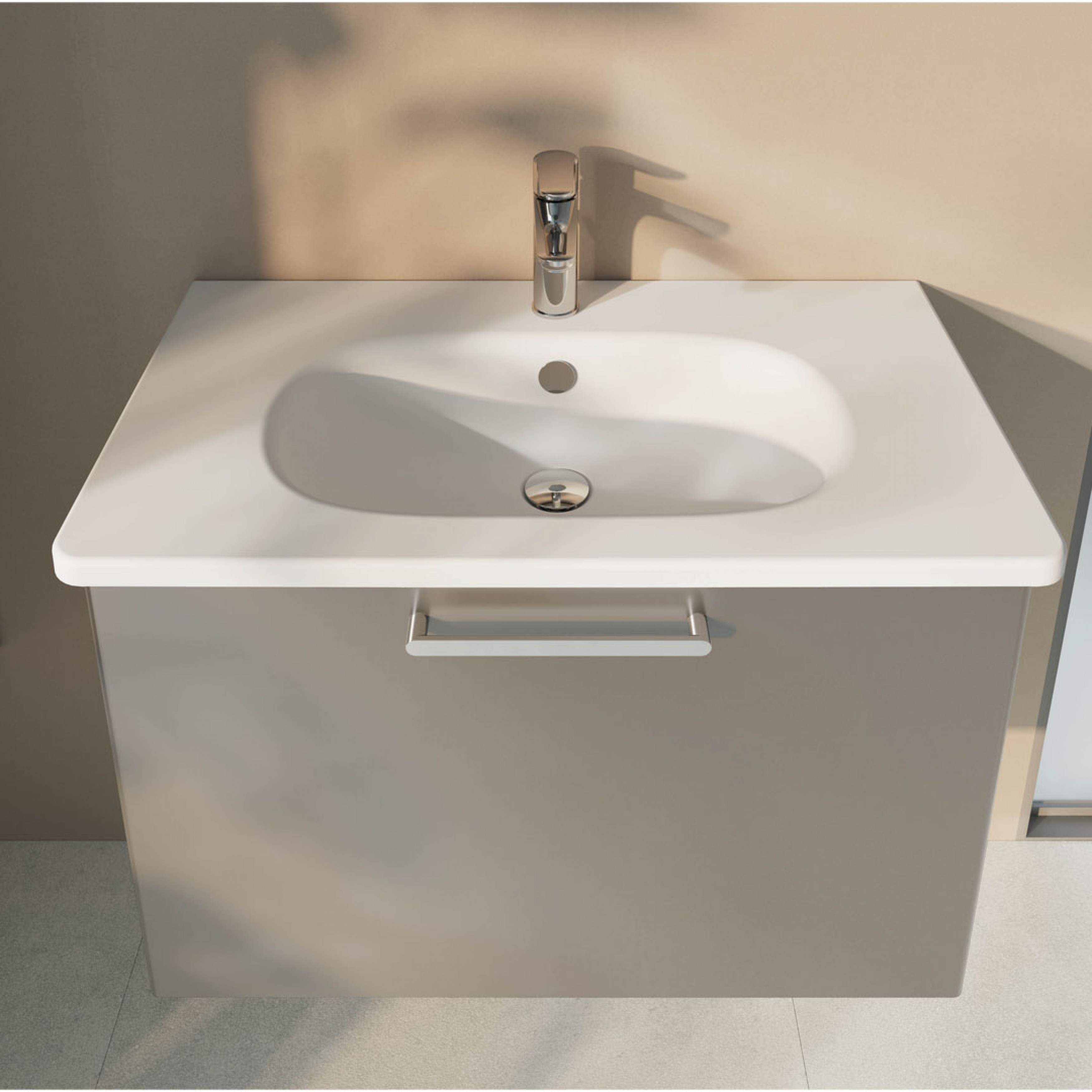 VitrA Zentrum washbasin with chrome coloured tapes and a grey storage drawn below